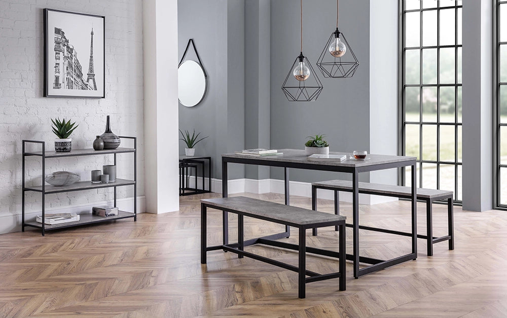 Adele Concrete Dining Table with Two Benches and Round Wall Mirror in Breakout Setting