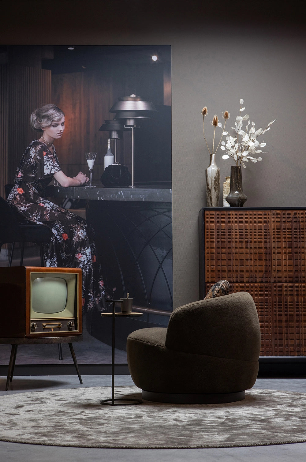 Allen 4 Door Cabinet in Walnut/Black Finish with Coffee Table and Upholstered Chair in Living Room Setting