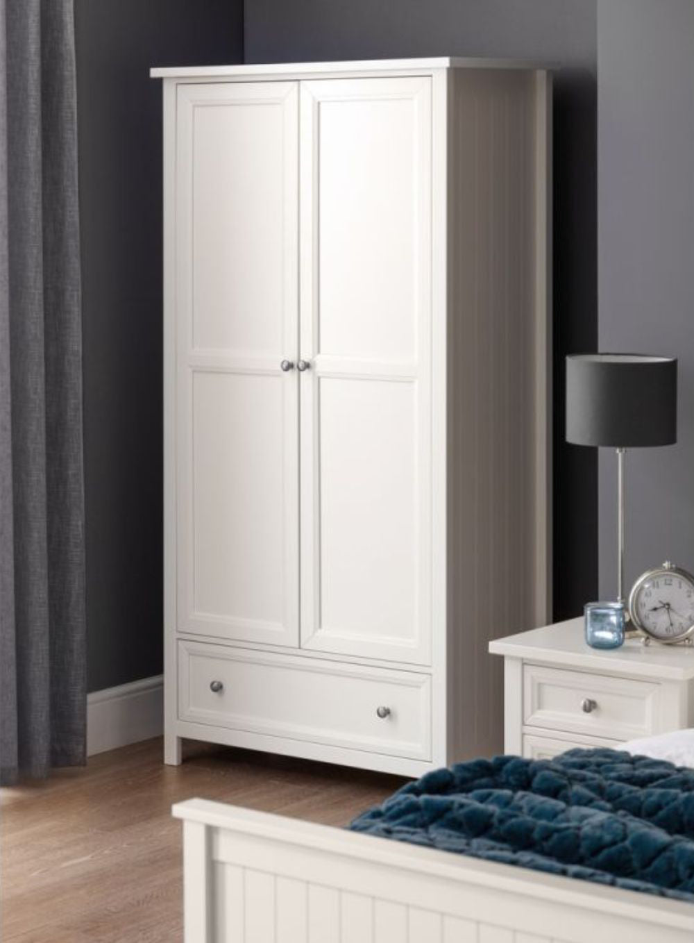 Anne 2 Door Combination Wardrobe Surf White with Alarm Clock in Bedroom Setting
