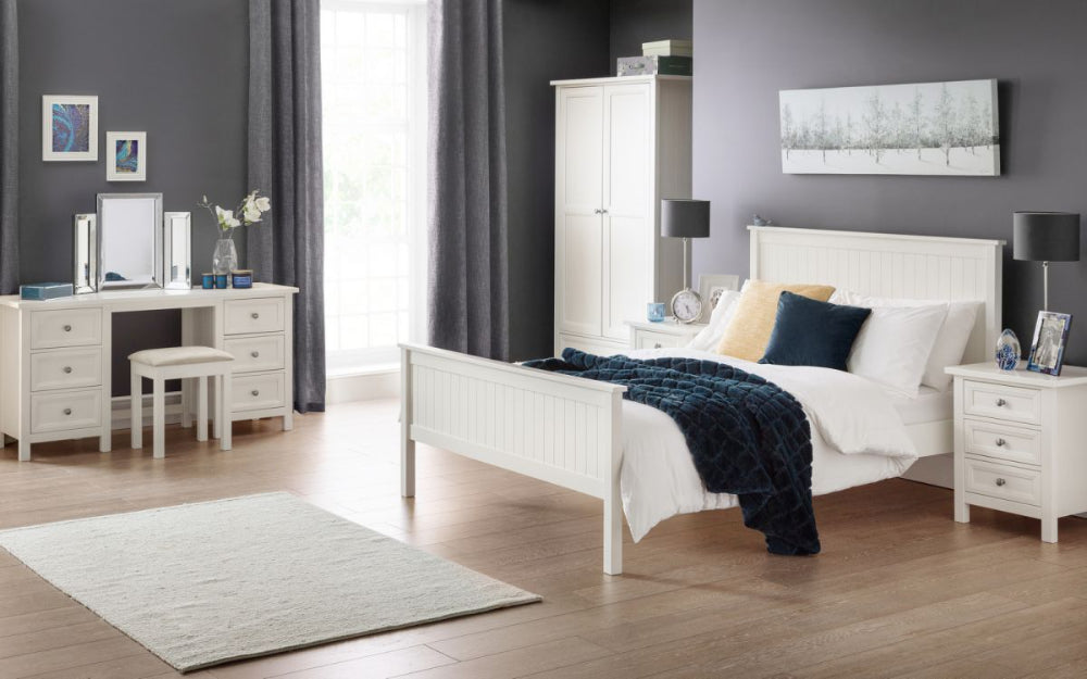 Annie 3 Drawer Bedside Table in Surf White Finish with Lampshade and Wardrobe in Bedroom Setting