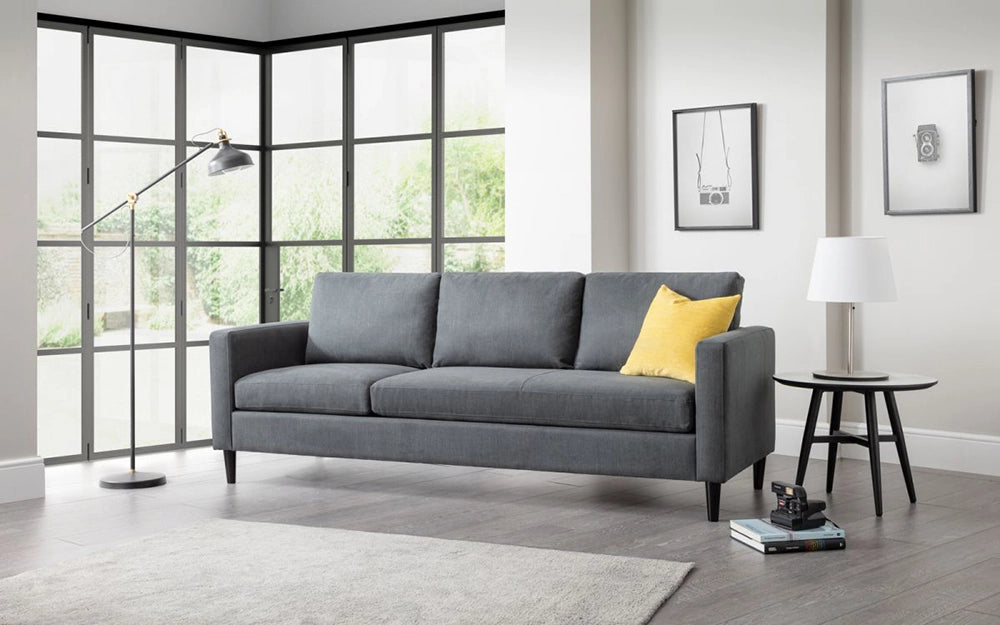 Aria Upholstered Corner Sofain Grey Finish with Four Wooden Leg Coffee Table and Standing Lamp in Livng Room Setting 2