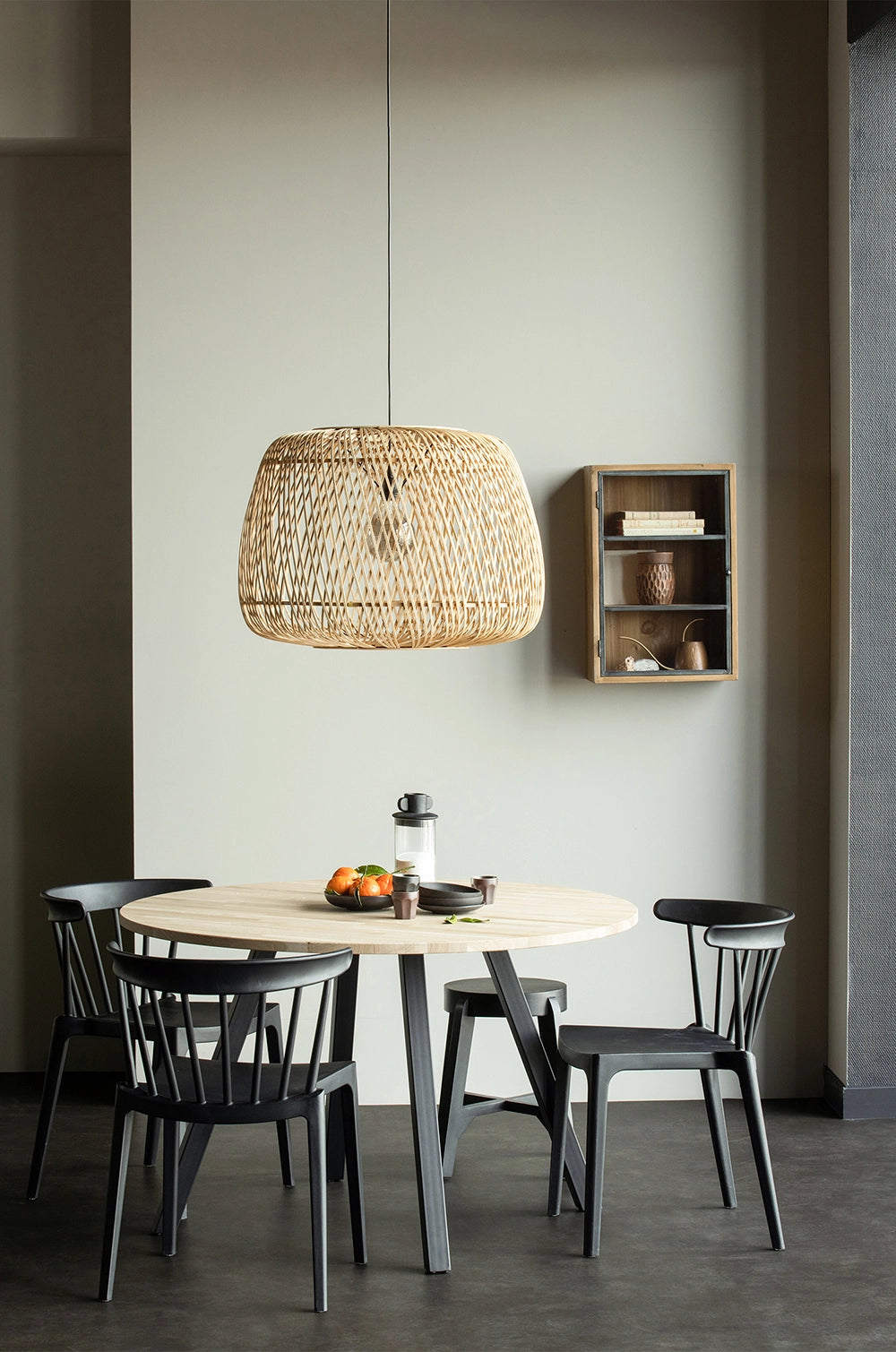 Ash Polypropylene Chair Black with Round Dining Table and Wooden Wall Cabinet in Dining Room Settings