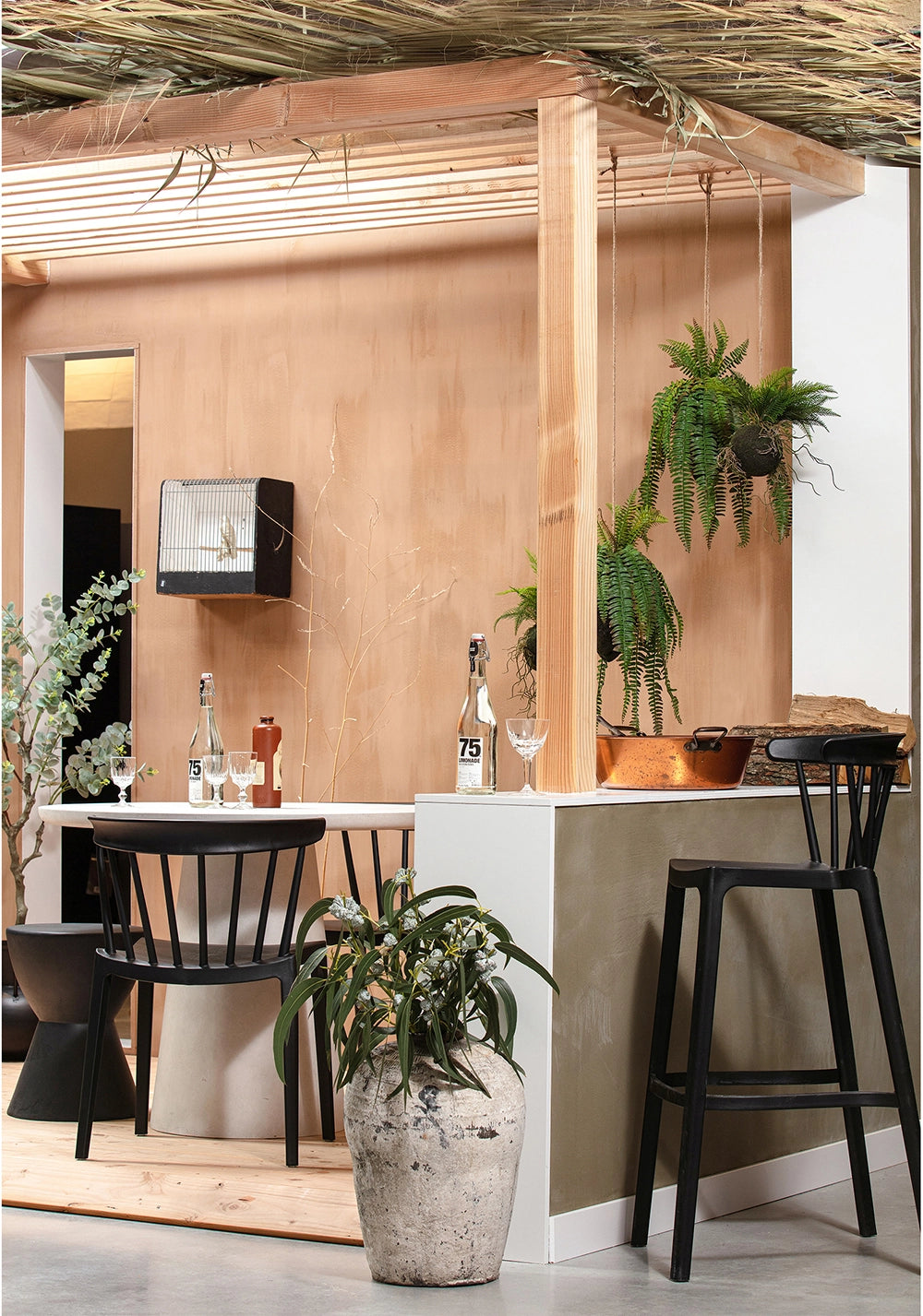 Ash Polypropylene Chair Black with White Bar Counter and Green High Chair in Mini Bar Settings