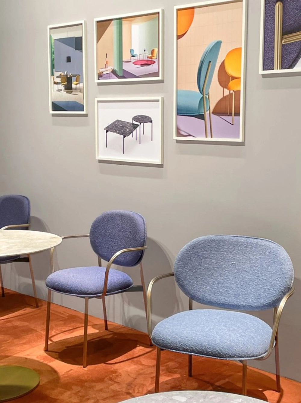 Blume Upholstered Fabric Armchair in Blue Finish with Wall Frame in Breakout Setting