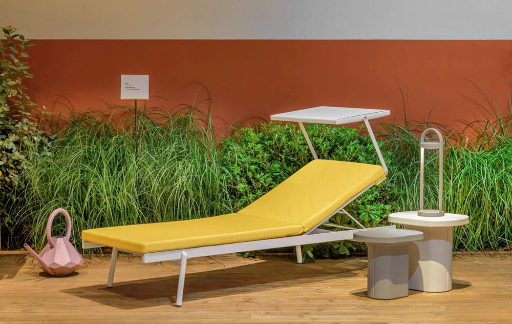 Caementum Monobloc Coffee Table in Grey Finish with Sun Lounger in Studio Setting