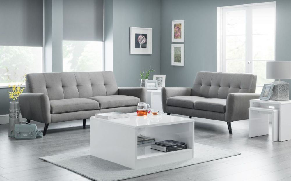 Capri Sofa Bed Grey with Nesting Table and Lampshade in Living Room Setting