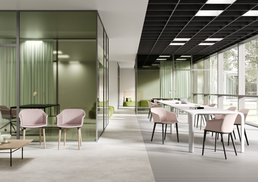 Capture Armchair with Seat Pad and 4 Wooden Legs in Pink Finish and White Table in Canteen Setting