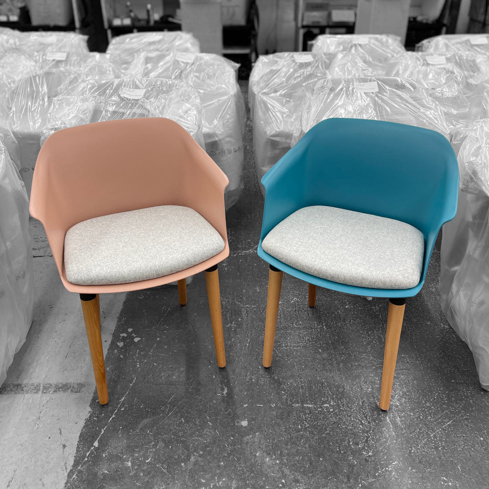 Capture Armchair with Seat Pad and 4 Wooden Legs in Two Toned Finish in Storage Setting 2