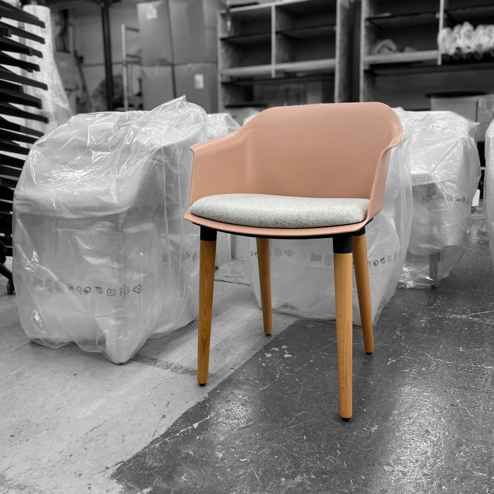 Capture Armchair with Seat Pad and 4 Wooden Legs in Two Toned Finish in Storage Setting 3