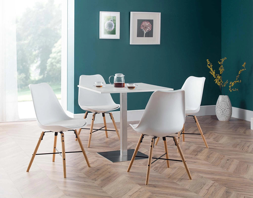 Cari Dining Chair in White Finish with Square Top Table and Wall Frame in Living Room Setting