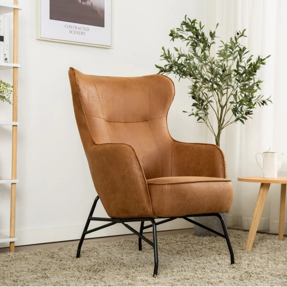 Carter High Backrest Accent Chair in Saddle Tan Finish with Plant Coffee Table in Living Room Setting