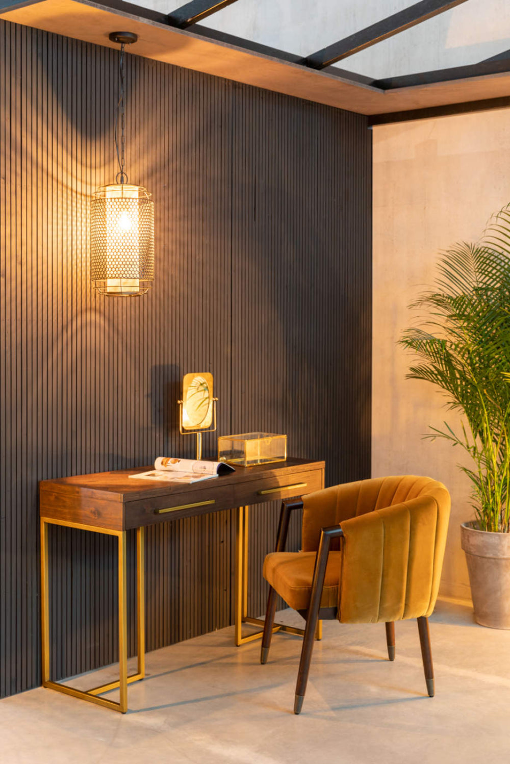 Cedar Hall Console Table with Indoor Plant and Lounge Chair in Living Room Setting