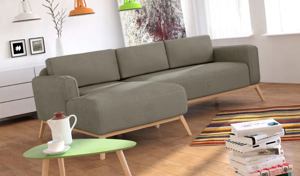 Chase Corner Sofa in Grey Finish with Coffee Table and Floor Rug in Living Room Setting