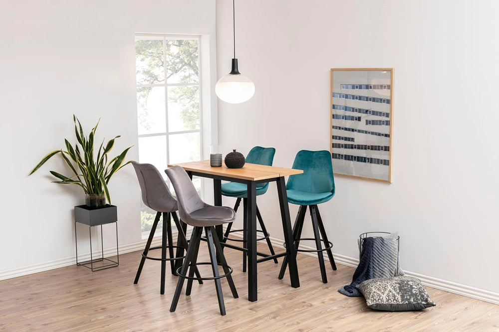 Cher Rectangular Top Bar Table in Oak Oiled Finish with Grey Stool and Wall Frame in Breakout Setting