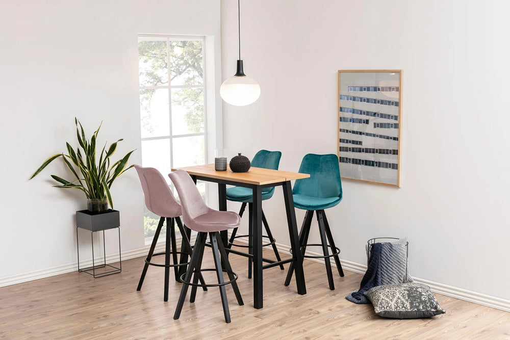 Cher Rectangular Top Bar Table in Oak Oiled Finish with Pink Stool and Wall Frame in Breakout Setting