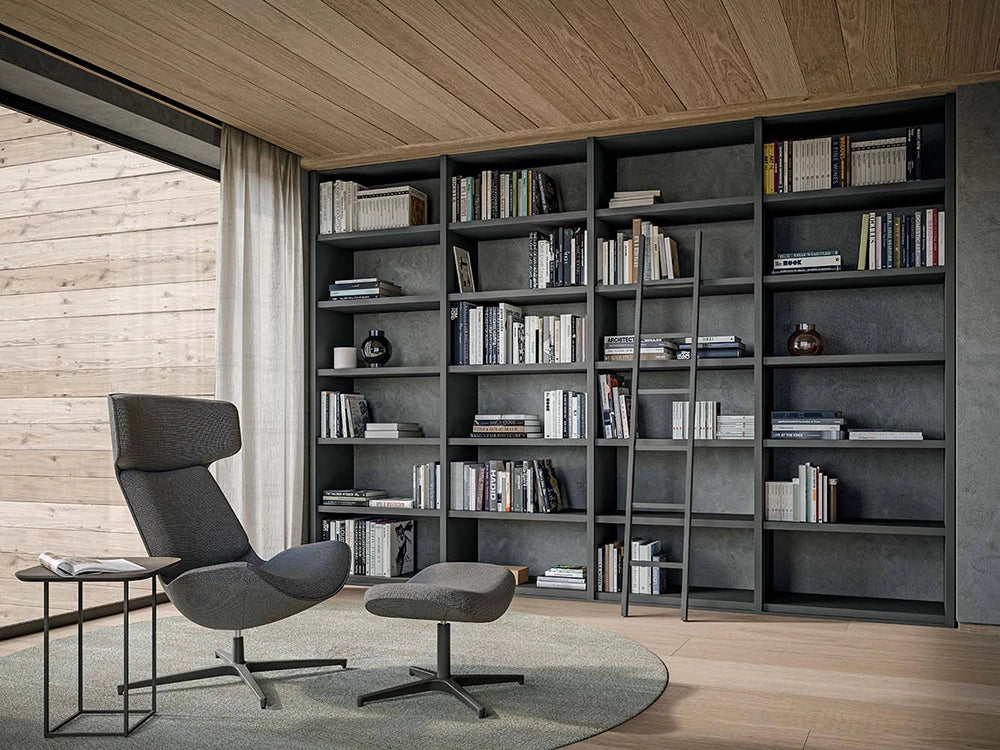 Cleopas Soft Seating with Coffee Table and Bookshelves in Breakout Setting