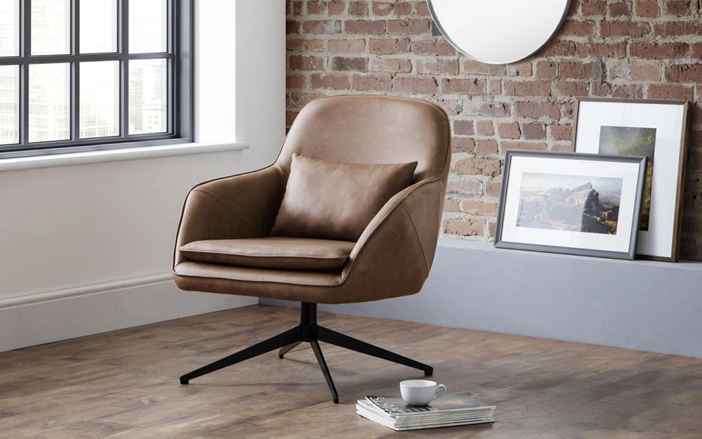 Davie Swivel Armchair in Brown Finish with Wall Frames and Mirror in Studio Set Setting