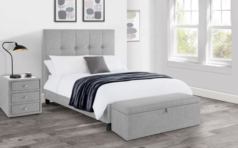 Delmar Upholstered Blanket Box in Light Grey Finish with Cushion and Lampshade in Bedroom Setting