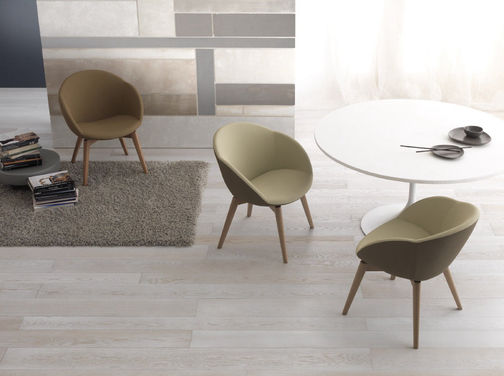 Elena Upholstered Chair with 4 Wooden Legs in Beige Finish with Round Table in Living Room Setting