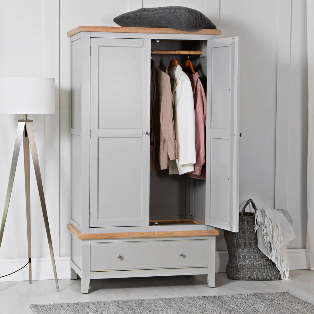 Elias 2 Door Wardrobe in Grey Finish with Laundry Basket and Floor Lamp in Bedroom Setting