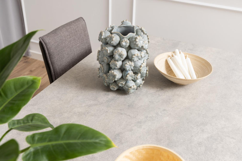 Evan Rectangular Dining Table Grey with Candles and Plant in Dining Setting