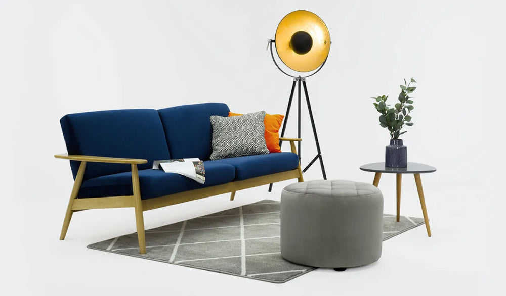 Felix 3 Seater Sofa Blue and Like Oak Finishes with Coffee Table and Floor Lamp in Studio Setting