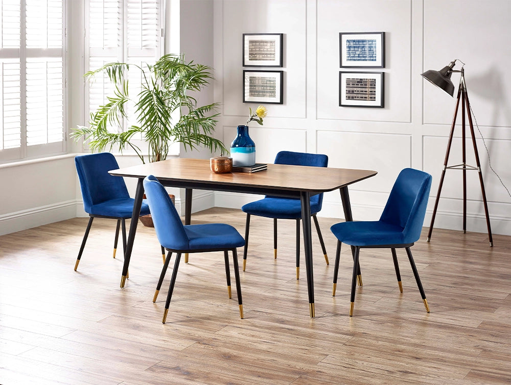 Fintan Square Dining Table in Walnut and Black Finish with Indoor Plant and Yellow Leather Chair in Dining Setting