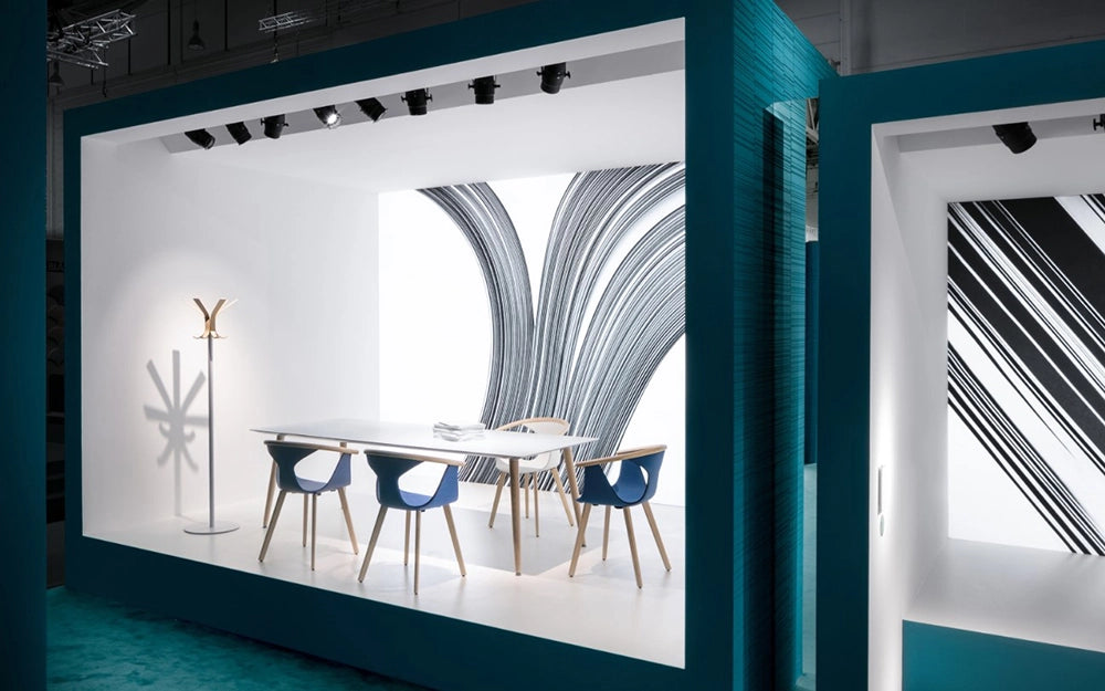 Fox Dining Chair with Armrests in Blue Finish with White Table in Booth Setting