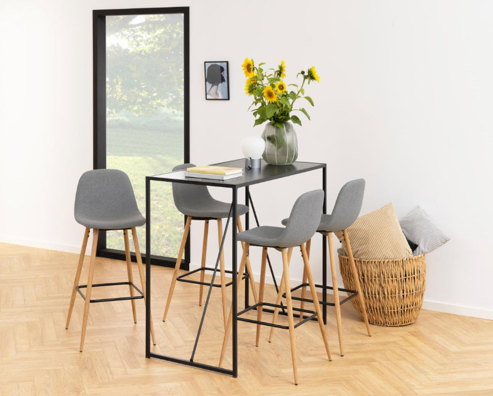 Fred Barstool with Footrest in Grey Finish with Hightop Table and Flower Vase in Living Room Setting
