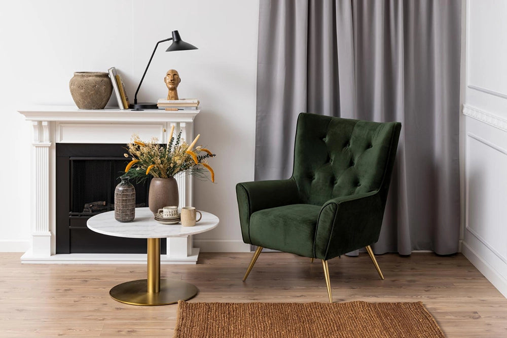 Hampton Round Coffee Table in Marble Brass Finish with Lounge Chair and Lamp Table in Living Room Setting