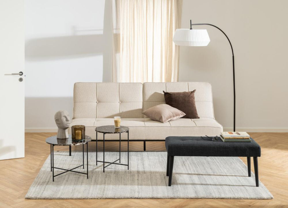 Harlie Marble Top Side Table in Brown Finish with Sofa and Floor Lamp in Living Room Setting