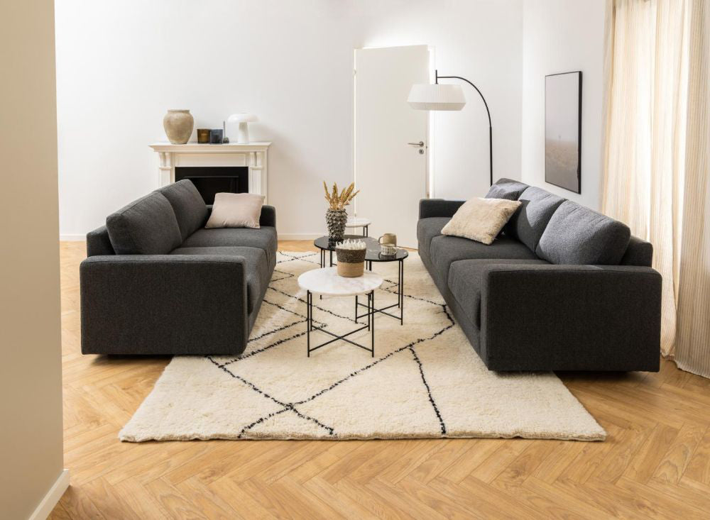 Harlie Marble Top Side Table in White Finish with Sofa and Floor Lamp in Living Room Setting