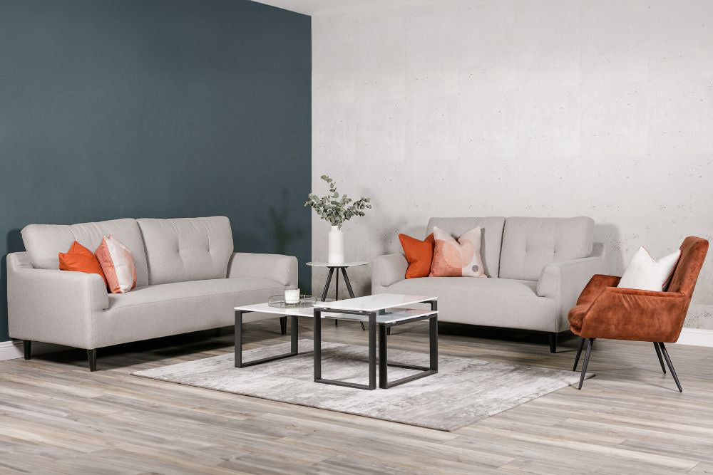 Heidi 2-Seater Sofa in Light Grey Finish with Side Table and Vase in Living Room Setting