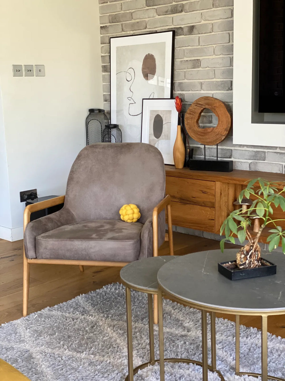 Hugo Armchair in Elephant Finish with Nesting Table and Media TV Unit in Living Room Setting