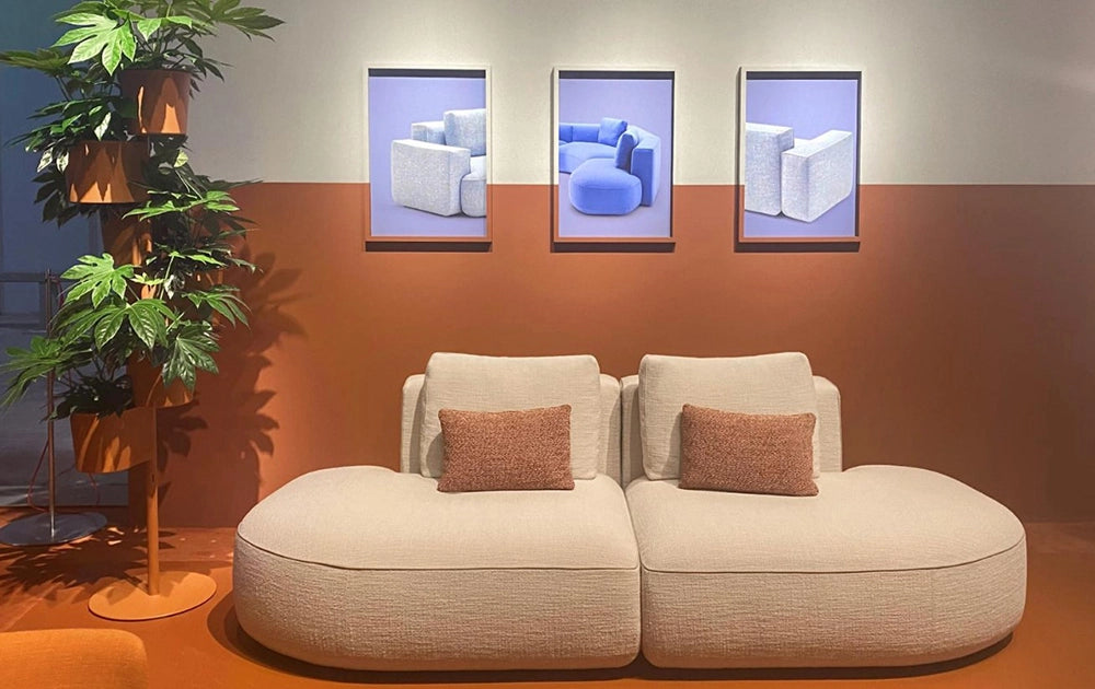 Jeff Corner Sofa with Chaise in Beige Finish with Indoor Plant and Wall Frame in Studio Setting