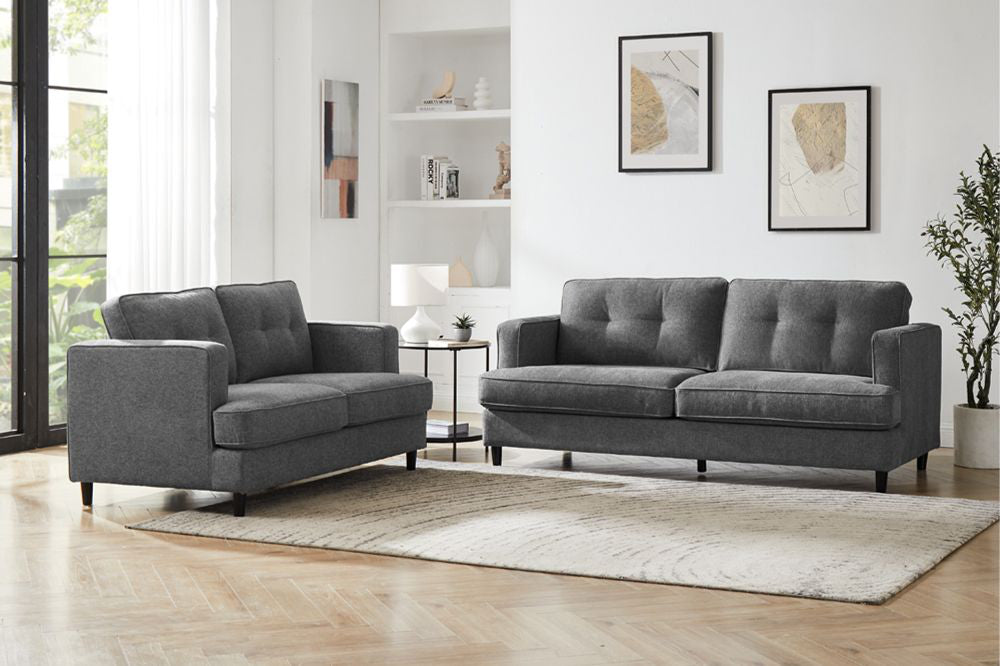 Jupiter 2-Seater Sofa in Grey Finish with Lampshade and Indoor Plant in Living Room Setting