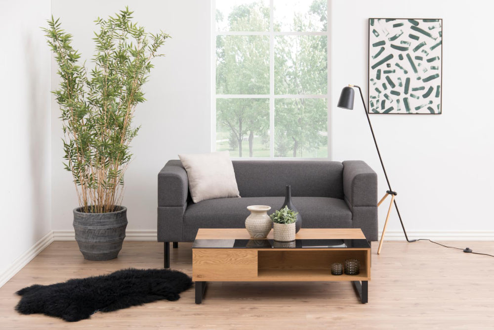 Lea Rectangular Wild Oak Coffee Table with Sofa and Lamp in Living Room Setting