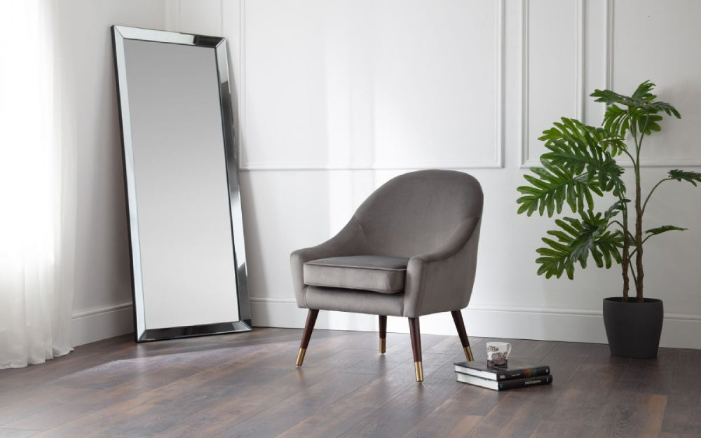 Levi Leaner Dress Mirror with Lounge Chair and Indoor Plant in Living Room Setting