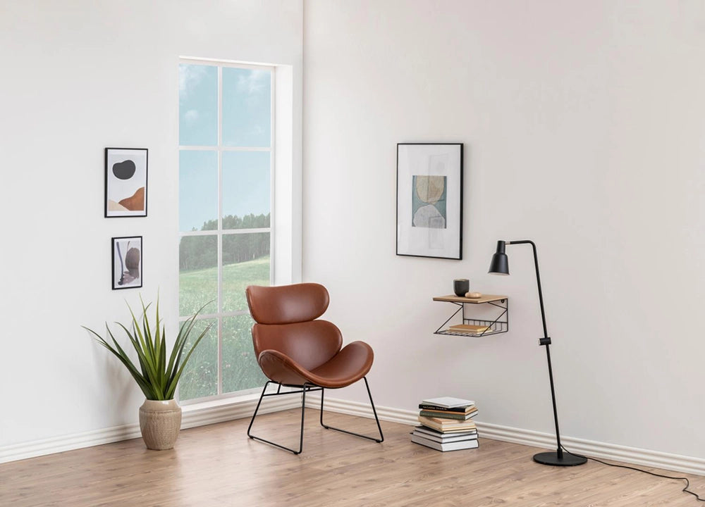 Lewis Accent Chair in Brown Finish with Black Standing Lamp and Wall Frame in Breakout Setting