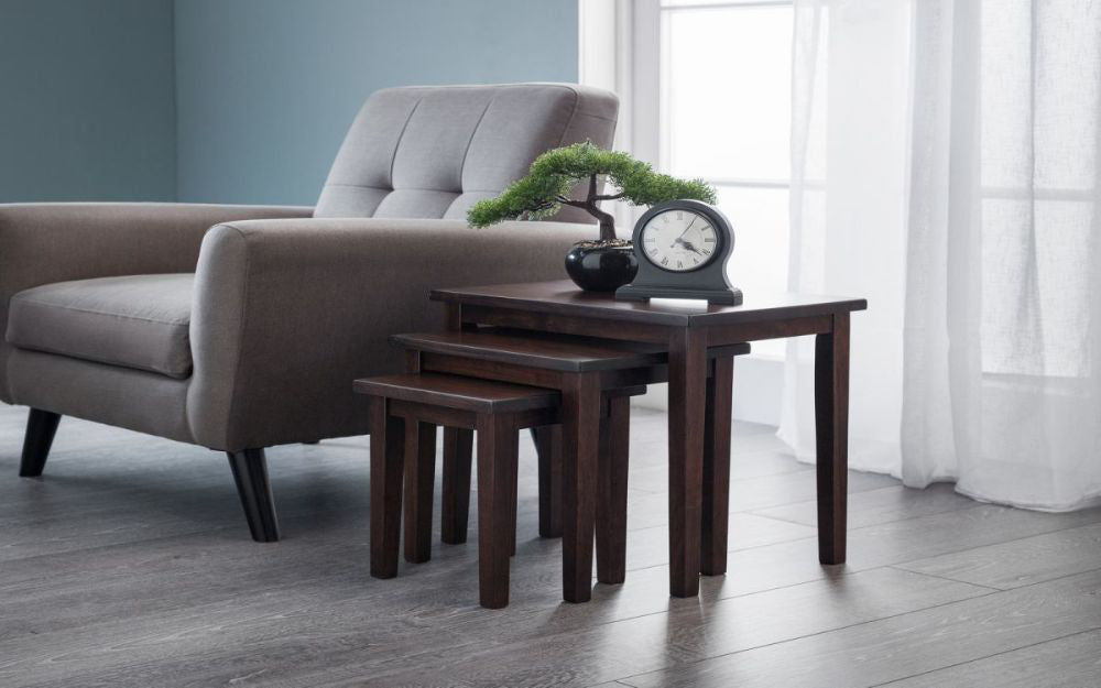Lyon Nest Of Tables Mahogany with Alarm Clock and Armchair in Living Room Setting