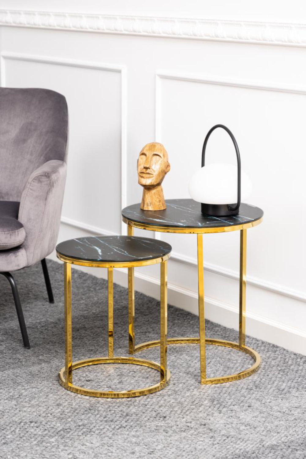 Lysa Round Nest of Tables Black Marble with Table Lamp and Floor Carpet in Living Room Setting
