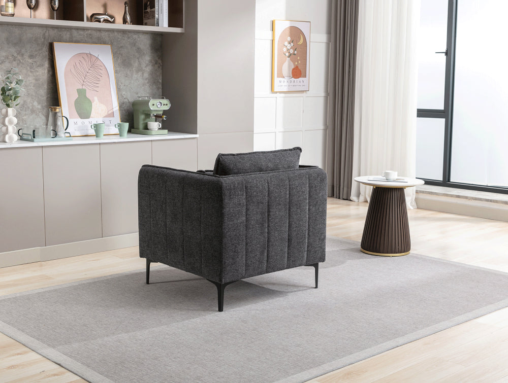 Norris Armchair in Dark Grey Finish with Side Table and Floor Rug in Living Room Setting 3