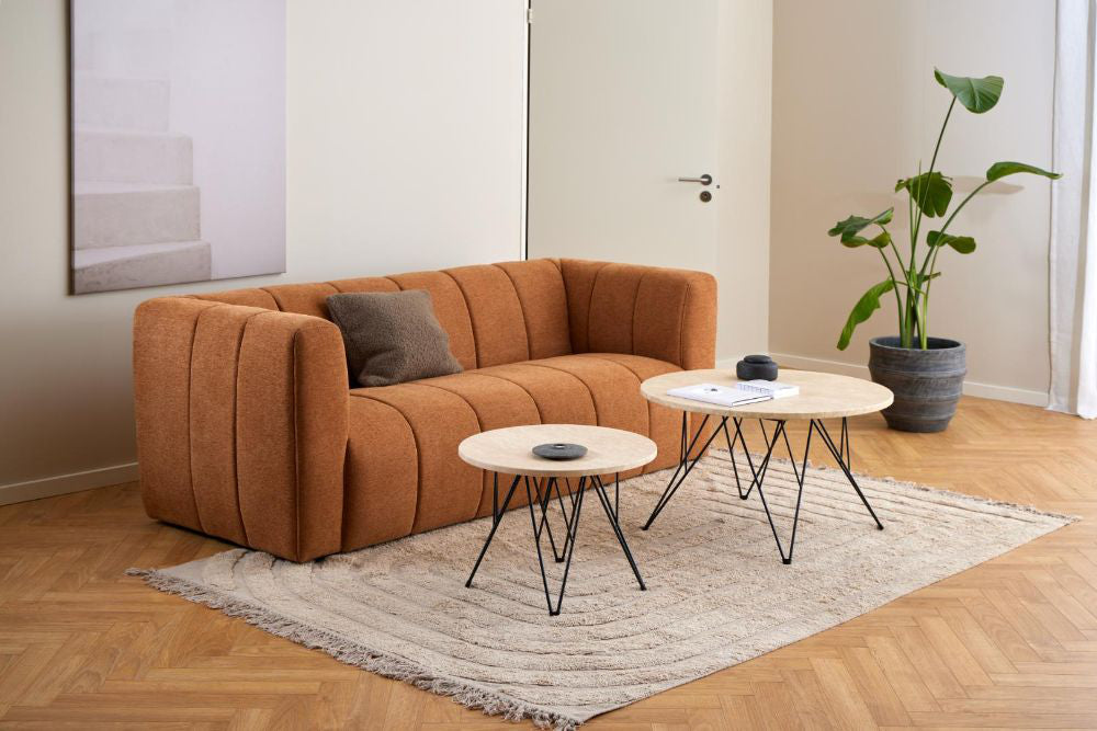 Penny Side Table in Beige and Black Finish with Sofa and Indoor Plant in Living Room Setting