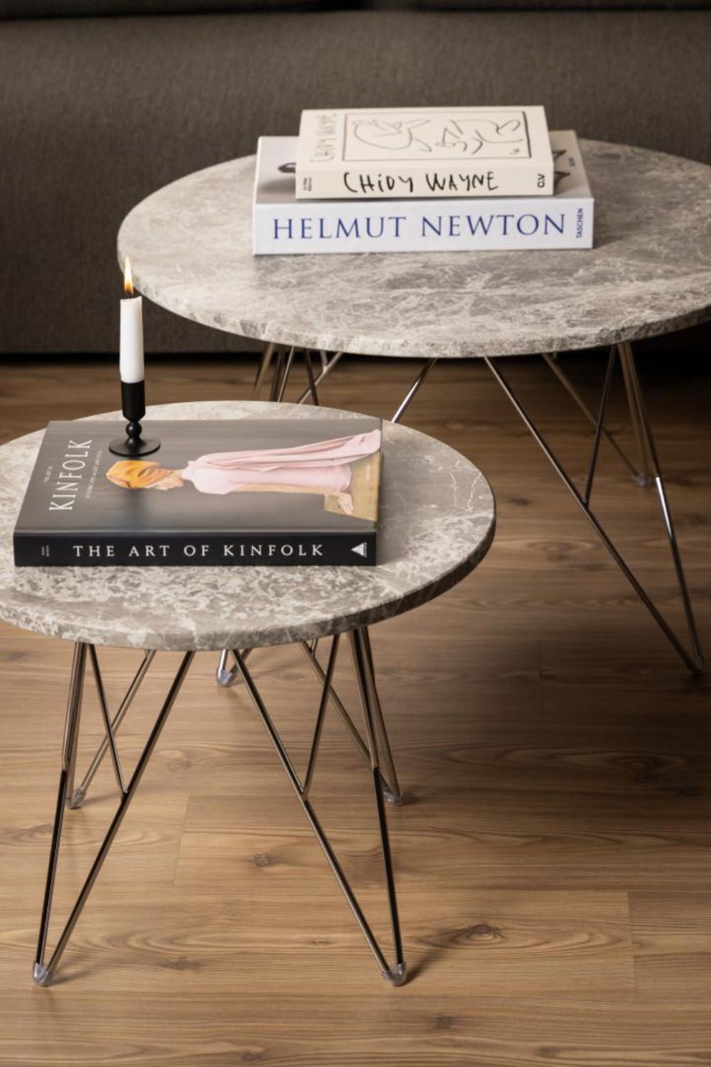 Penny Side Table in Grey and Chrome Finish with Books in Living Room Setting