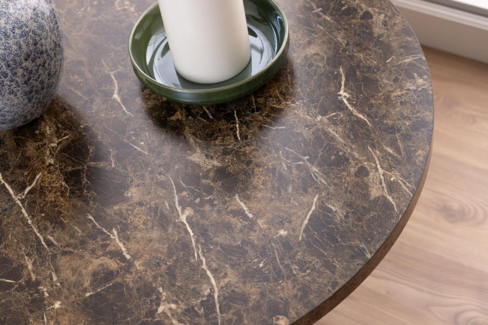 Ramble Round Coffee Table in Brown Marble Finish with Candle and Antique Vase Detail