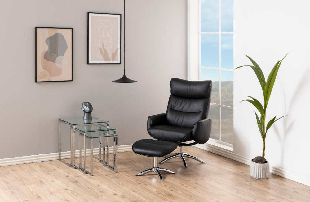 Riva Nest of 3 Tables Clear Glass with Lounge Chair and Indoor Plant in Living Room Setting