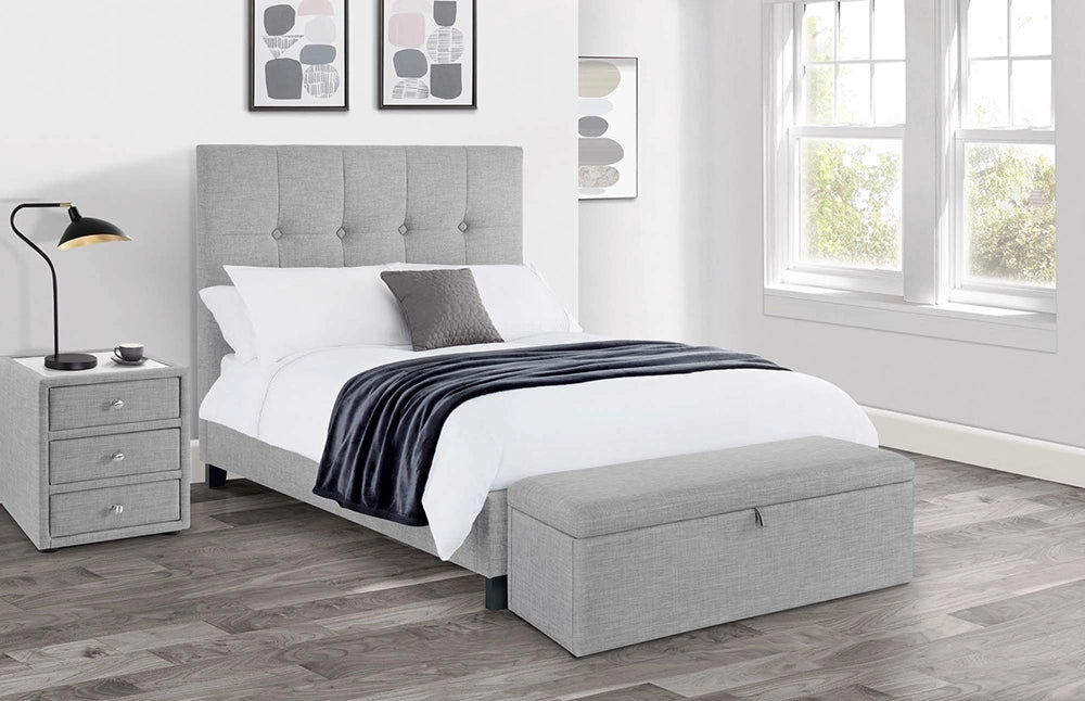 Roberto High Headboard Bed in Light Grey Finish with Blanket Box and Black Table Lamp in Bedroom Setting