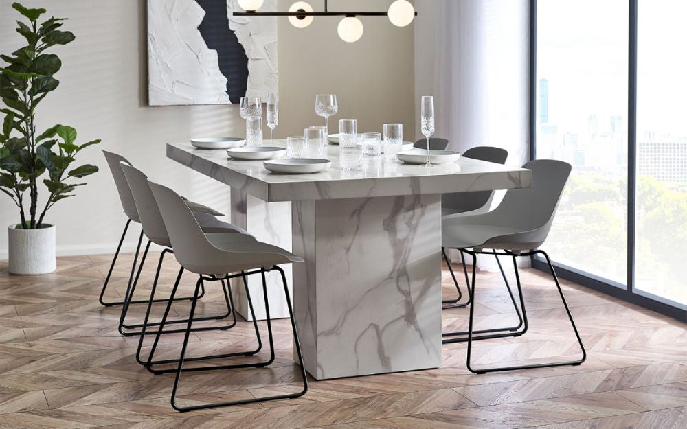 Ryker Marble Dining Table in White Finish with Chair and Indoor Plant in Dining Setting 2