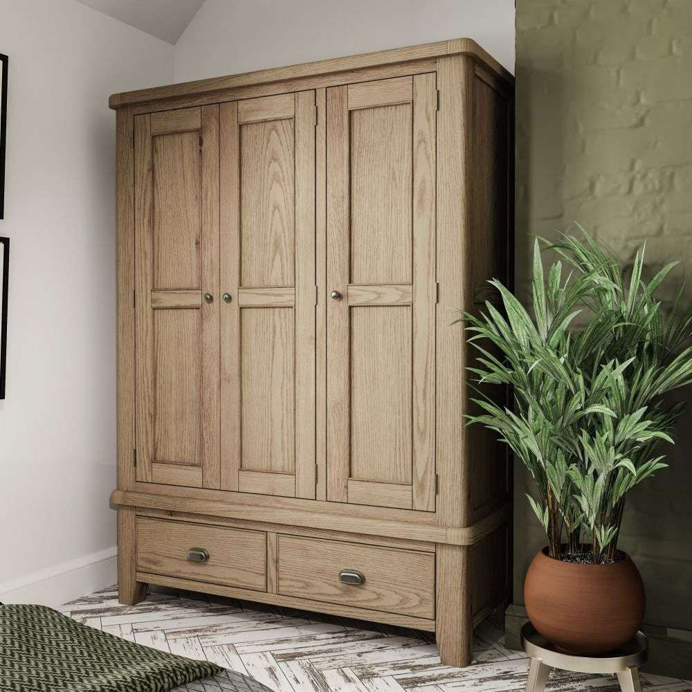 Sadie 3 Door Wardrobe in Smoked Oak Finish with Indoor Plant in Bedroom Setting