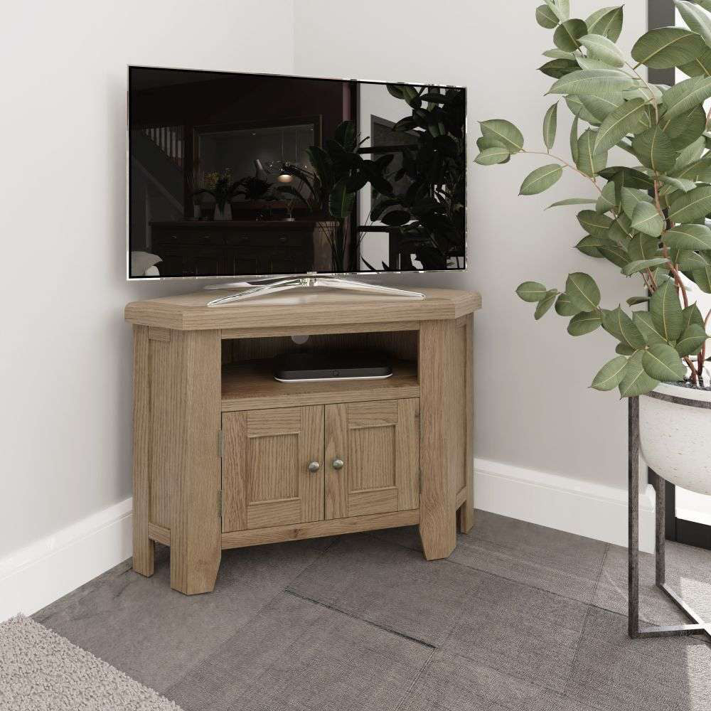 Sadie Corner Media Unit in Smoked Oak Finish with Indoor Plant in Living Room Setting